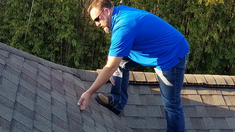 Slide of Elite Roofers