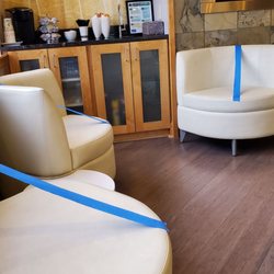 Concierge Dental Group - Waiting area, just like many with seating blocked off.