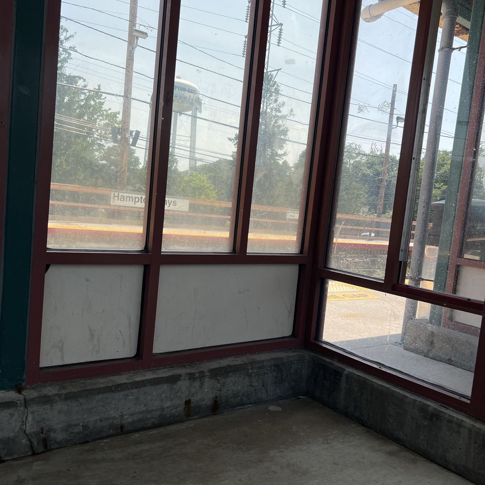 LIRR - Hampton Bays Station - Waiting area with little bench - Train Stations Near Me - Hampton Bays, New York LIRR - Hampton Bays Station - Waiting area with little bench - Train Stations Near Me - Hampton Bays, New York