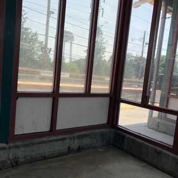 LIRR - Hampton Bays Station - Waiting area with little bench - Train Stations Near Me - Hampton Bays, New York LIRR - Hampton Bays Station - Waiting area with little bench - Train Stations Near Me - Hampton Bays, New York