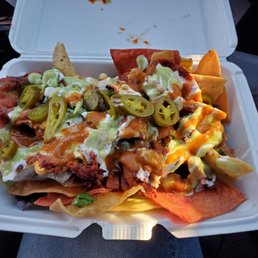 Al Pastor Nachos.  $9 and worth every penny!