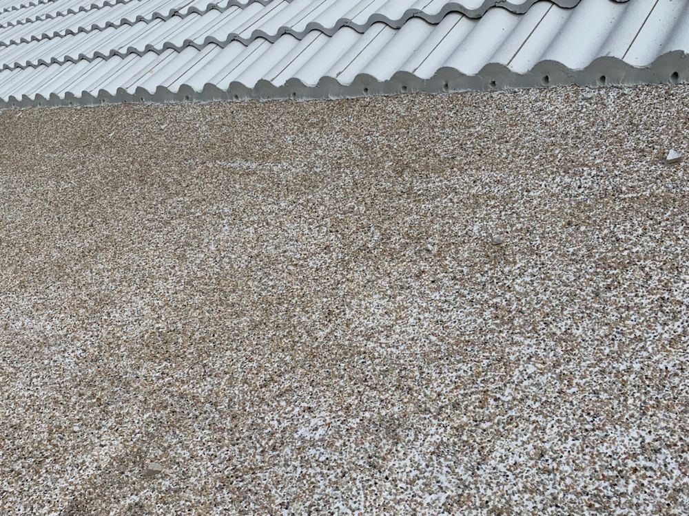 Slide of Mr. & Mrs. Shingles Roofing