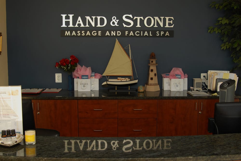 Hand & Stone Massage and Facial Spa Logo