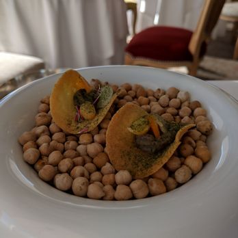 La Chèvre d'Or - Amuse-bouche: Socca - 4 stars. Like lightly fried chips, dense yet crunchy. Wed lunch 2018-10-24 - French Near Me - Èze, 06