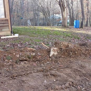 American Drilling & Pump Service - More back fill and rocks new hole for downspout pipe - Well Drilling Near Me - Stone Creek, Ohio American Drilling & Pump Service - More back fill and rocks new hole for downspout pipe - Well Drilling Near Me - Stone Creek, Ohio