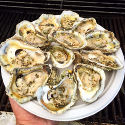 Byrd's Seafood - Fresh out of Little Bay, from Windmill Point Oyster Co. Lightly Roasted topped with Basil Pesto.