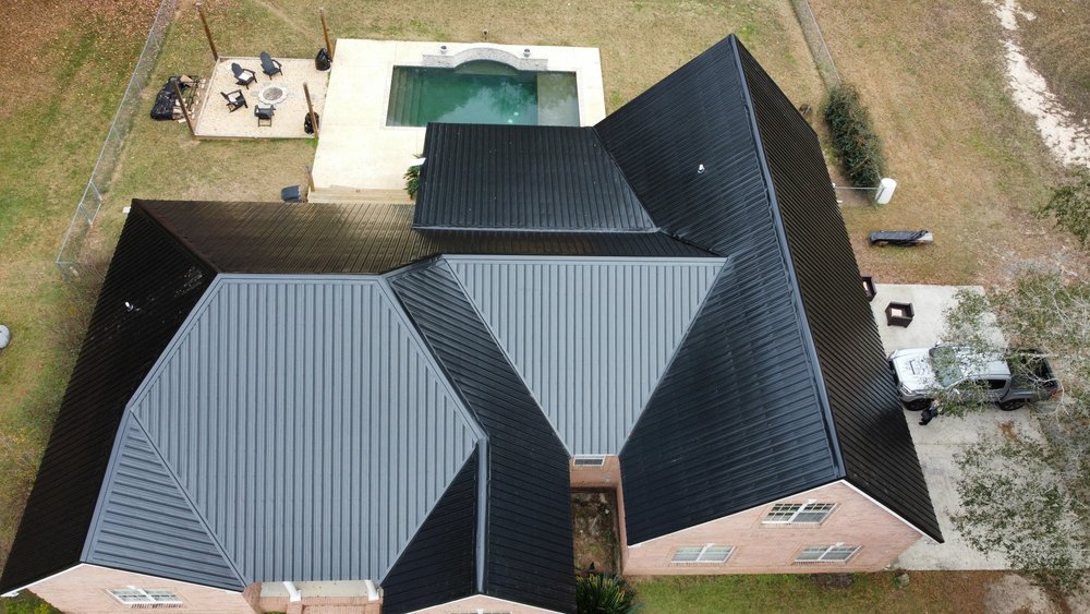 Slide of E-Squared Roofing