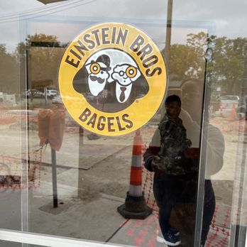 Einstein Bros. Bagels - a man standing in front of a window - Bagels Near Me - Grosse Pointe, Michigan Einstein Bros. Bagels - a man standing in front of a window - Bagels Near Me - Grosse Pointe, Michigan