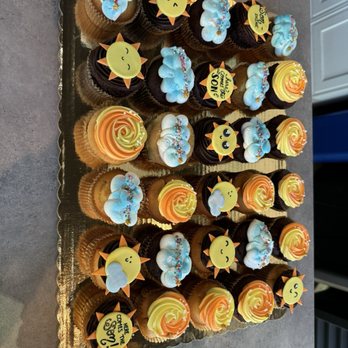Sweet Bites Bakery & Brunch - Custom sun and cloud rainbow styled chocolate and vanilla cupcakes, including gluten-free options. - Bakeries Near Me - Berkeley, California