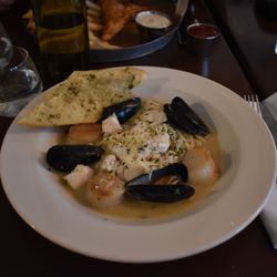 Fin & Fern - Delicious Seafood Scampi - Mussels, scallops, and haddock over angel hair with scampi sauce