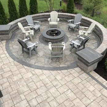 Urban Escapes - a fire pit surrounded by lawn chairs - Landscaping Near Me - Eagan, Minnesota