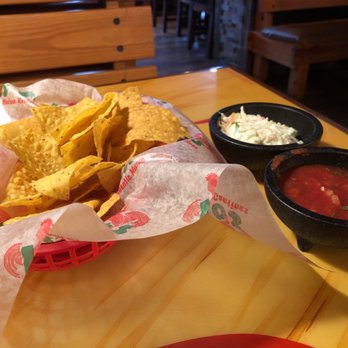 Los Gallos Mexican Restaurant - Warm crispy chips served with coleslaw and salsa. Surprisingly delicious to mix the two on the chip. - Mexican Near Me - Bedford, Ohio
