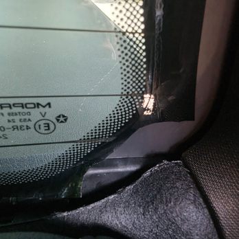Tint Express - Hard to see but it's not flat, it's sticking up. - Car Window Tinting Near Me Tint Express - Hard to see but it's not flat, it's sticking up. - Car Window Tinting Near Me