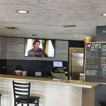 Syps Grille - a bar with a television screen - American Near Me - Hartford, Connecticut Syps Grille - a bar with a television screen - American Near Me - Hartford, Connecticut