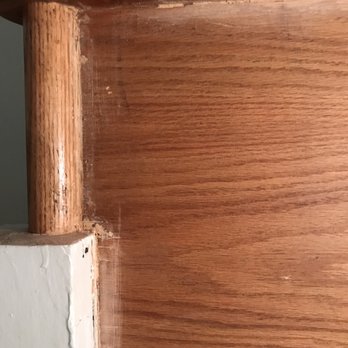 Quality Work Construction Corp - a close up of a wooden stair - General Contractors Near Me - Chicago, Illinois