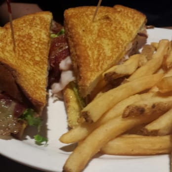 Cheddar's Scratch Kitchen - Club sandwich. So buttered up that it slipped from my friends hands twice. She also threw up after eating here. - Comfort Food Near Me - Lafayette, Indiana