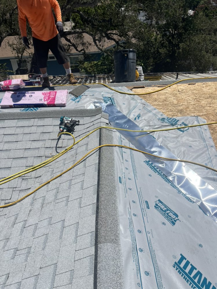 Slide of The Roofing Company