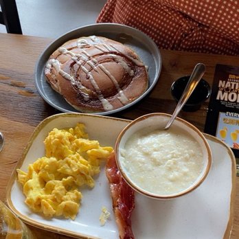 Brunches - All American -choice of pancake, eggs, grits and piece of bacon - Breakfast & Brunch Near Me - Charlotte, North Carolina Brunches - All American -choice of pancake, eggs, grits and piece of bacon - Breakfast & Brunch Near Me - Charlotte, North Carolina