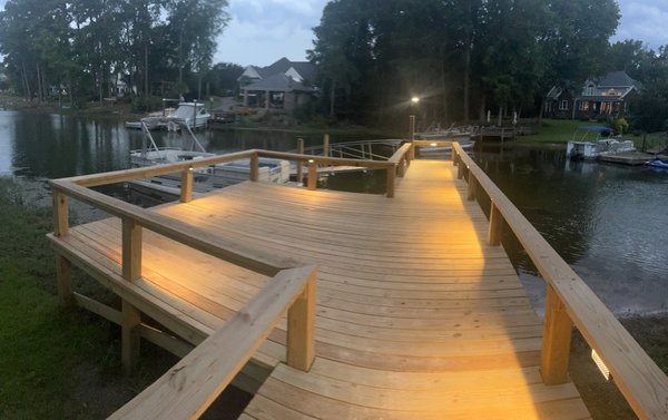 Deck lighting - Installed low voltage lighting under the handrails around the entire dick. Controlled by a transformer with multiple on/off settings.