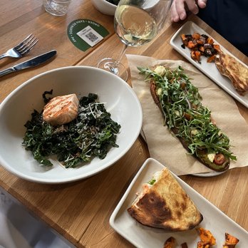 True Food Kitchen - Our full spread - they even split our entrees for us! - New American Near Me - Phoenix, Arizona True Food Kitchen - Our full spread - they even split our entrees for us! - New American Near Me - Phoenix, Arizona