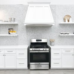 Bedrosians Tile & Stone - Countertop: Sequel Quartz, Brilliant White  Backsplash: White Carrara Mosaic, Honed  Floor: Titus, Gray