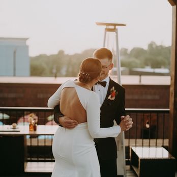 Sandstone Terrace - a bride and groom dancing on a deck - Bars Near Me - Iron Mountain, Michigan Sandstone Terrace - a bride and groom dancing on a deck - Bars Near Me - Iron Mountain, Michigan