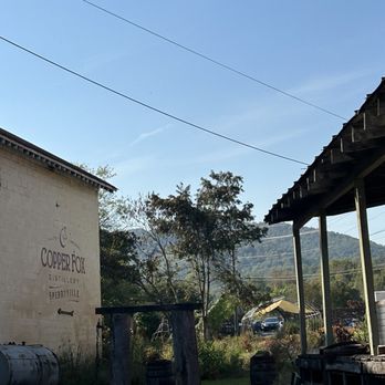 Copper Fox Distillery - Outside with view of the mountain. - Distilleries Near Me - Sperryville, Virginia