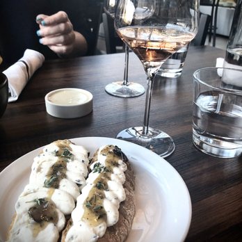 Carboy Winery - Denver - Whipped ricotta bruschetta with rose - Wine Tasting Room Near Me - Denver, Colorado Carboy Winery - Denver - Whipped ricotta bruschetta with rose - Wine Tasting Room Near Me - Denver, Colorado