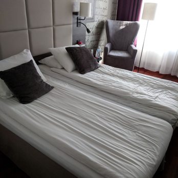 Clarion Collection Hotel Carlscrona - Beds and corner chair - Hotels Near Me - Karlskrona, G