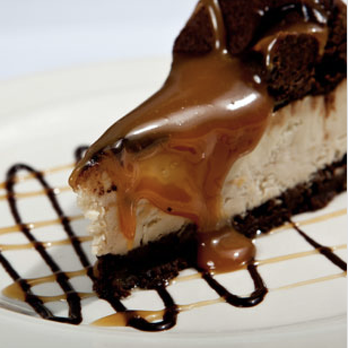 Theo's Eatery - a slice of cake with caramel drizzle - Pizza Near Me - Orillia, Ontario