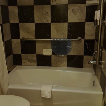 Ocean Inn & Suites - Bathroom- clean but dark - Hotels Near Me - St. Simons Island, Georgia