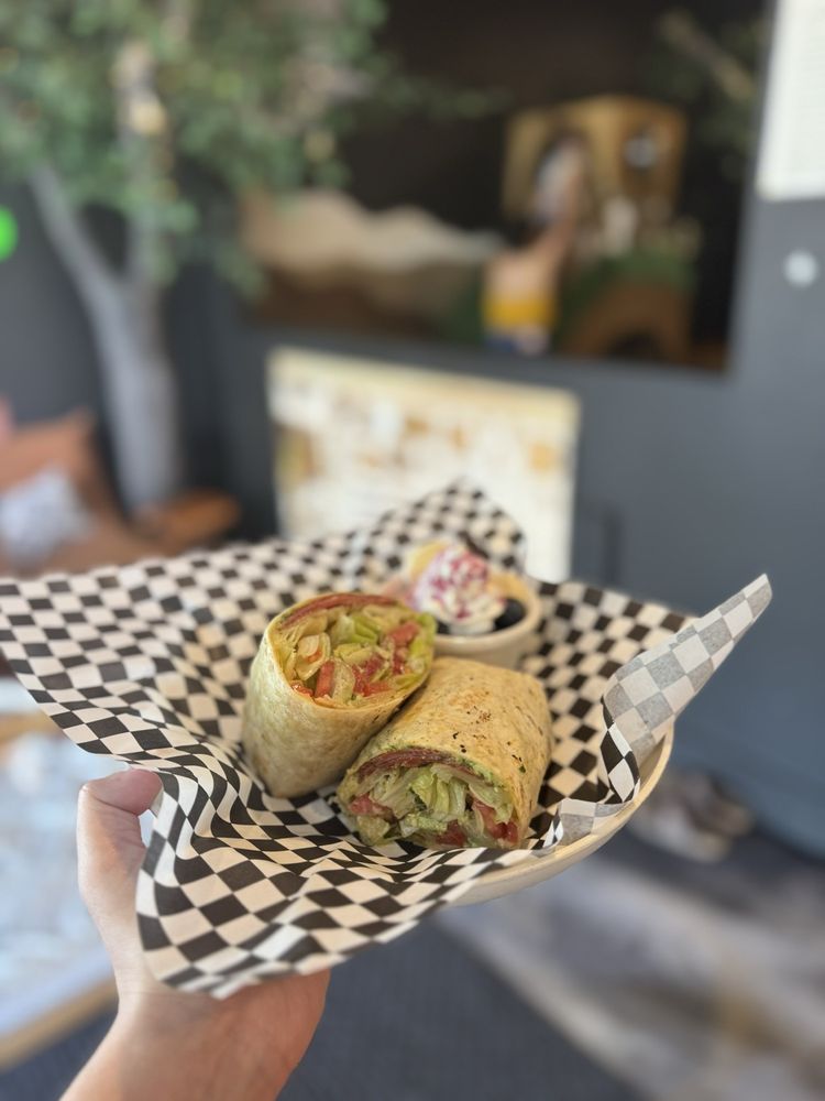 Peculiar Play Cafe Logo