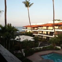 Drinking coffee on balcony looking out on the ocean.