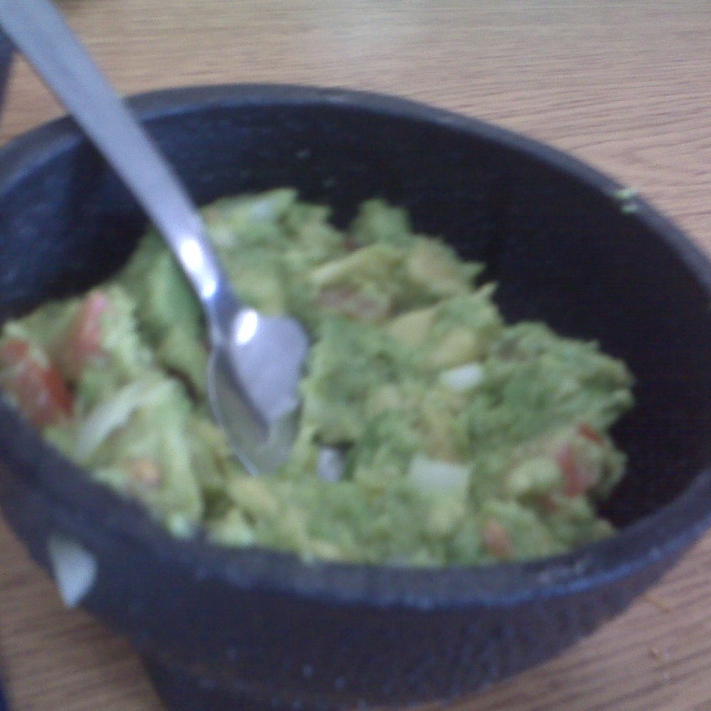 Rincon Latino - fresh guacamole, clearly - Salvadoran Near Me - Houston, Texas