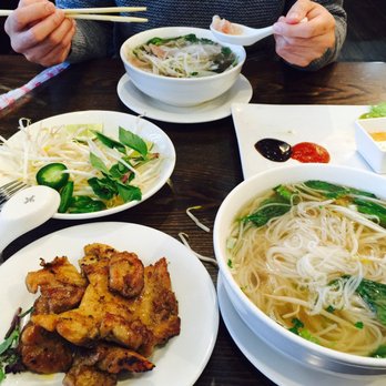Saigon Pho - Grilled chicken pho (L) medium pho. The portion difference is huge for a $1 difference. - Vietnamese Near Me - East Hanover, New Jersey