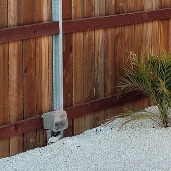Mr Serrato Electric - Outlet along the fence, for our water feature. - Electricians Near Me Mr Serrato Electric - Outlet along the fence, for our water feature. - Electricians Near Me