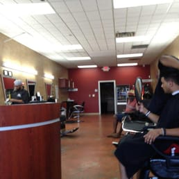 At the barbershop, gettin it hooked up.
