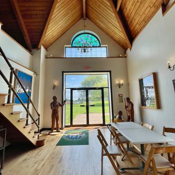Duckwalk Vineyards - a dining room with a stained glass window - Wineries Near Me - Water Mill, New York Duckwalk Vineyards - a dining room with a stained glass window - Wineries Near Me - Water Mill, New York