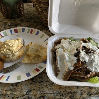 Gyro Spot - falafel, hummus, pita on the left and a gyro salad on the right. - Mediterranean Near Me - Nashville, Tennessee