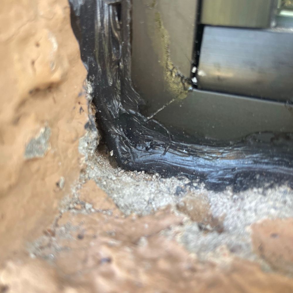 True View Windows & Glass - Hole between wall and window to the frame, beautiful caulk work, I have seen chewing gum under a desk done with more consistency. - Windows Installation Near Me - Phoenix, Arizona