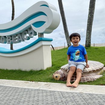Deerfield Beach - Gotta get our touristy photo in front of the famous Deerfield Beach wave sign. - Beaches Near Me - Deerfield Beach, Florida