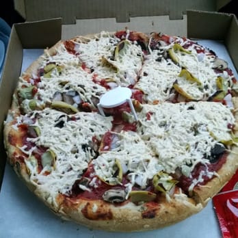 Conans Pizza South - Medium deep dish vegan pizza with artichoke, onion, and mushroom. - Pizza Near Me - Austin, Texas Conans Pizza South - Medium deep dish vegan pizza with artichoke, onion, and mushroom. - Pizza Near Me - Austin, Texas