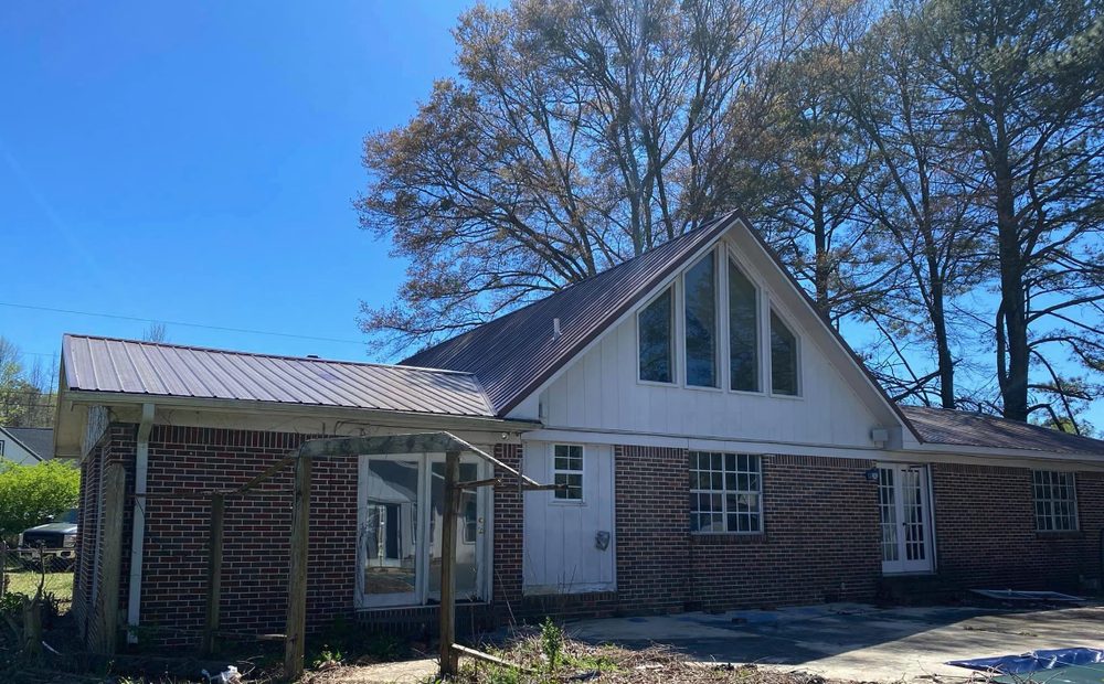 Slide of Backwoods Roofing