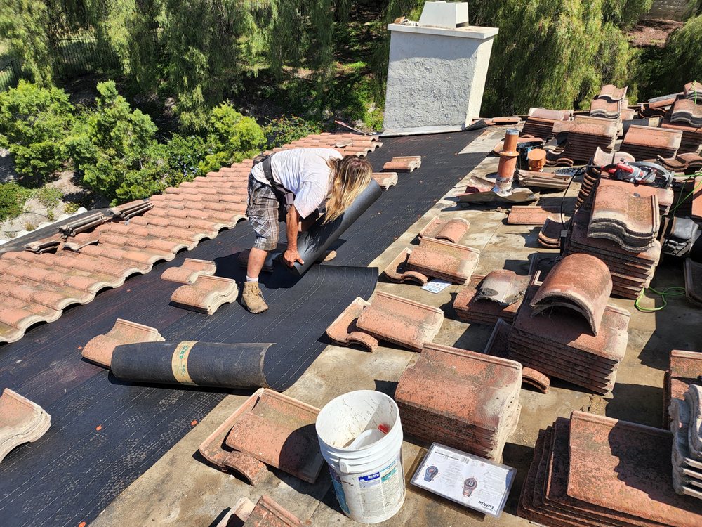 Slide of Bretts Roofing Repair And Raingutter Service