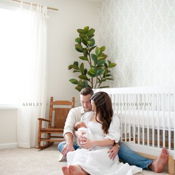 Ashley Line Photography - lifestyle newborn session mom and dad sitting on floor of nursery snuggling new baby - Session Photography Near Me Ashley Line Photography - lifestyle newborn session mom and dad sitting on floor of nursery snuggling new baby - Session Photography Near Me