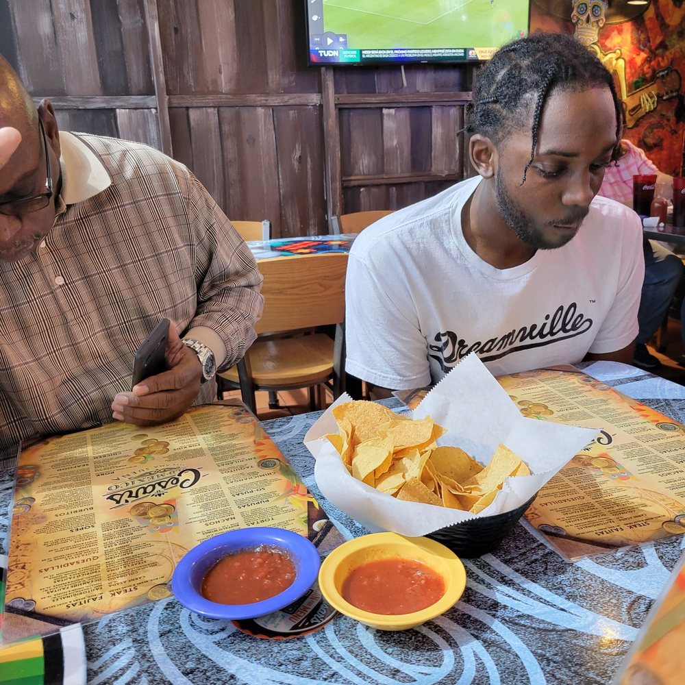 Cesar's Old Mexico - Family checking out the menu!! - Mexican Near Me - Springfield, Missouri Cesar's Old Mexico - Family checking out the menu!! - Mexican Near Me - Springfield, Missouri