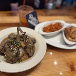 Rake's Place - Lamb chops, potatoes, honey carrots, grilled shrimp, and scallops.