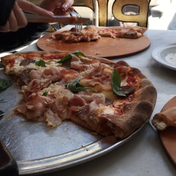 Capizzi - Pizza with pancetta, sausage and basil. - Pizza Near Me - New York, New York Capizzi - Pizza with pancetta, sausage and basil. - Pizza Near Me - New York, New York