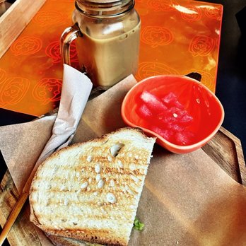 October Cafe - Caramel iced latte and breakfast panini - Coffee & Tea Near Me - Chicago, Illinois October Cafe - Caramel iced latte and breakfast panini - Coffee & Tea Near Me - Chicago, Illinois