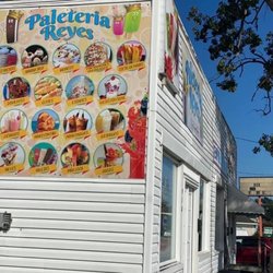 Paleteria Reyes - Menu on the side of the store.